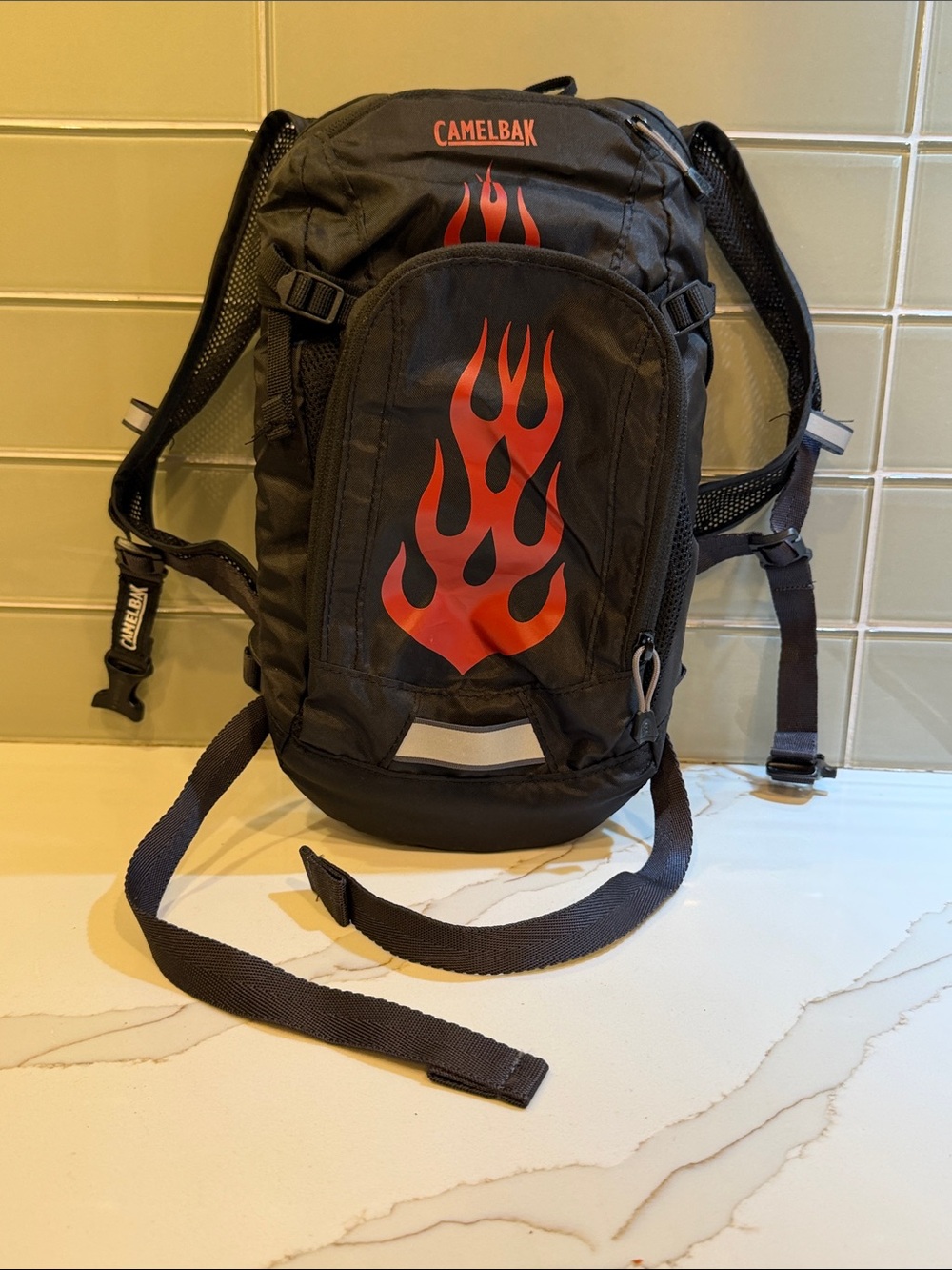 CamelBak KIDS Black Backpack with Red Flame Design